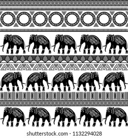 African tribal seamless pattern with animals and geometric ornaments. Abstract monochrome background. Textile design. Vector illustration.