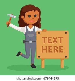 african woman carpenter with wood text sign