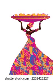 An African woman in a colorful dress with a basket of fruits on her head. Located in the lower right corner of the picture