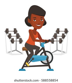 African woman riding stationary bicycle in the gym. Woman exercising on stationary training bicycle. Woman training on exercise bicycle. Vector flat design illustration isolated on white background.