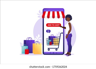 African woman shopping online on mobile phone. Concept of online shopping, Online store payment. Bank credit cards, secure online payments and financial bill. Smartphone wallets.