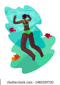 African Woman is Swimming in the Blue Water of Ocean omn Vacation in Tropical Country