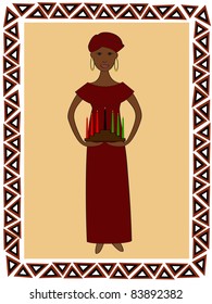 an African woman in traditional clothes with a kwanzaa kinara