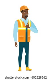 African-american builder in hard hat giving thumb up. Full length of smiling builder with thumb up. Cheerful builder showing thumb up. Vector flat design illustration isolated on white background.