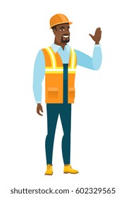 African-american builder in hard hat waving his hand. Full length of builder waving hand. Builder making greeting gesture - waving hand. Vector flat design illustration isolated on white background.