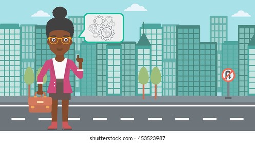 An african-american business woman with a briefcase pointing her forefinger at cogwheels on a city background. Vector flat design illustration. Horizontal layout.