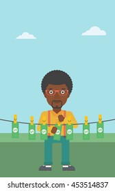 An african-american businessman drying banknotes on the clothesline on the background of blue sky. Man loundering money. Vector flat design illustration. Vertical layout.