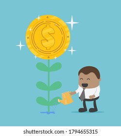 African-american businessman watering money flower