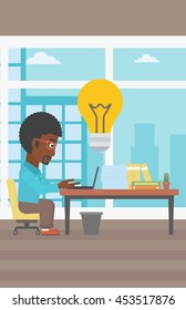 An african-american businessman working on laptop in office and idea bulb above the table. Successful business idea concept. Vector flat design illustration. Vertical layout.