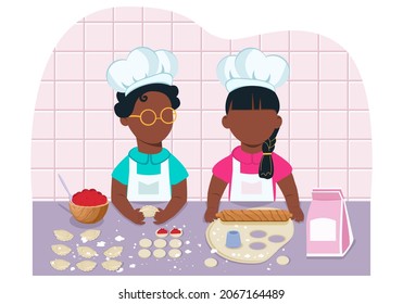 African-American children making flour dough together in the kitchen. Molding by hand. Cooking with flour, dough, berries. Kids cooking, cooking, fun, learning