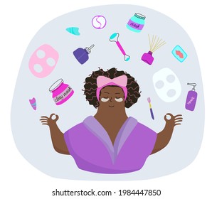 An African-American girl takes care of her face.  Skin care products, facial massage, rejuvenation.