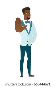 African-american groom in a wedding suit showing palm hand. Full length of groom showing palm hand. Groom making stop gesture by his palm. Vector flat design illustration isolated on white background.