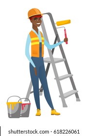 African-american house painter in uniform holding paint roller in hands. Smiling house painter standing near step-ladder and paint cans. Vector flat design illustration isolated on white background.