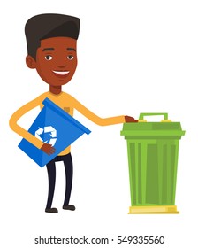 African-american man holding recycling bin while standing near a trash can. Young man carrying recycling bin. Waste recycling concept. Vector flat design illustration isolated on white background.