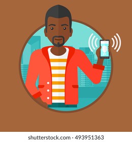 African-american man holding ringing mobile phone on a city background. Man answering a phone call. Man with ringing phone in hand. Vector flat design illustration in the circle isolated on background