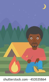 An african-american man kindling a campfire on the background of camping site with tent. Tourist relaxing near campfire. Vector flat design illustration. Vertical layout.