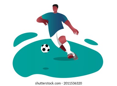 an African-American man plays football. Football competitions on the field. A young man with a ball is engaged in sports. Soccer player kicking ball