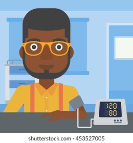 An African-american Man Taking Care Of His Health And Checking His Blood Pressure With Digital Meter. Vector Flat Design Illustration. Square Layout.