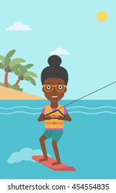 An african-american sports woman wakeboarding on the sea. Wakeboarder making tricks. Woman studying wakeboarding. Young woman riding wakeboard. Vector flat design illustration. Vertical layout.