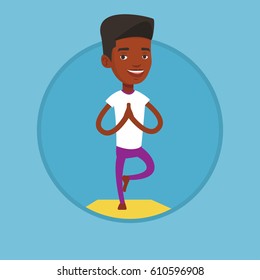 African-american sportsman meditating in yoga tree position. Sportsman standing in yoga tree pose. Young man doing yoga on the mat. Vector flat design illustration in the circle isolated on background