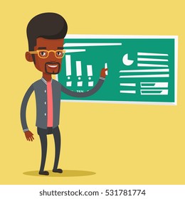 An african-american teacher standing in classroom. Teacher standing in front of blackboard with a piece of chalk in hand. Teacher writing on chalkboard. Vector flat design illustration. Square layout.