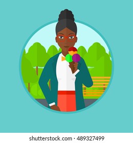 An african-american woman eating a big ice cream in cone. Woman holding an ice cream in hand. Woman enjoying an ice cream at park. Vector flat design illustration in the circle isolated on background.