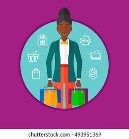 An african-american woman holding shopping bags. Happy young woman carrying shopping bags on the background of shopping icons. Vector flat design illustration in the circle isolated on background.