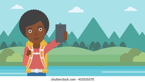 An african-american woman making selfie on the background of mountains. Travelling woman with backpack taking photo with cellphone. Vector flat design illustration. Horizontal layout.