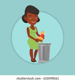 African-american woman putting junk food into trash bin. Woman refusing to eat junk food. Woman rejecting junk food. Diet concept. Vector flat design illustration in the circle isolated on background.