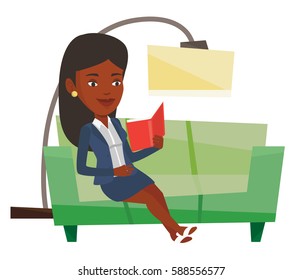 African-american woman relaxing with a book on the couch at home. Woman reading a book on sofa. Woman sitting on a sofa and reading a book. Vector flat design illustration isolated on white background