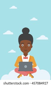 An african-american woman sitting on a cloud with a laptop on her knees. Happy woman using cloud computing technology. Cloud computing concept. Vector flat design illustration. Vertical layout.