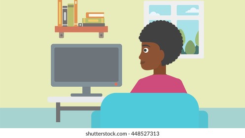 An african-american woman sitting on the couch in living room and watching tv vector flat design illustration. Horizontal layout.