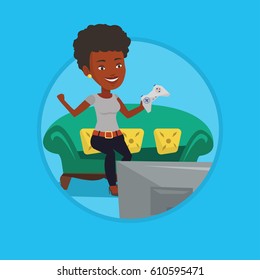 African-american woman sitting on a sofa and playing video game on the television. Woman with console in hands playing video game. Vector flat design illustration in the circle isolated on background