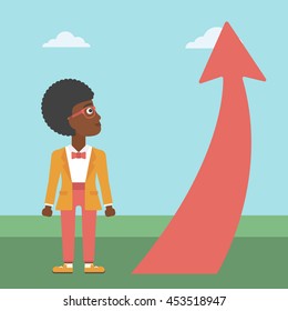 An african-american young business woman looking at a red arrow going up. Successful business concept. Vector flat design illustration. Square layout.