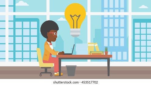 An african-american young business woman working on her laptop in office and a big idea bulb above the table. Successful business idea concept. Vector flat design illustration. Horizontal layout.