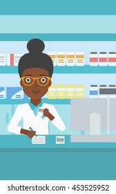 An african-american young female pharmacist in medical gown standing at pharmacy counter, writing on clipboard and holding prescription in hand. Vector flat design illustration. Vertical layout.