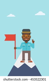 An african-american young happy businessman holding a red flag on the top of the mountain. Successful business concept. Vector flat design illustration. Vertical layout.