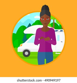 An african-american young woman standing in front of motor home. Woman with arms crossed enjoying her vacation in camper van. Vector flat design illustration in the circle isolated on background.