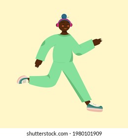 Afro american black skin girl runs in bright clothes with headphones 
