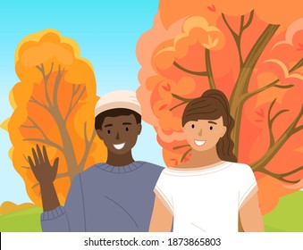 Afro american boy wave his hand. Male character is standing next to the girl. Guy in sweater smiles and raises his hand. Forest with trees on the background. People are walking in the autumn forest