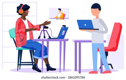 Afro american woman is listening to music. Working in recording studio. Girl editing a music video. Female character on a computer monitor sings into a microphone. Guy stands with a laptop and works