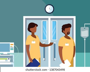 afro couple medicine workers in operating theater