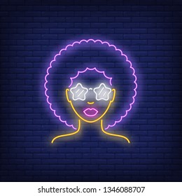 Afro retro girl neon sign. Glowing neon female singer with retro hair style on brick wall background. Vector illustration can be used for topics like night club, dance studio, disco