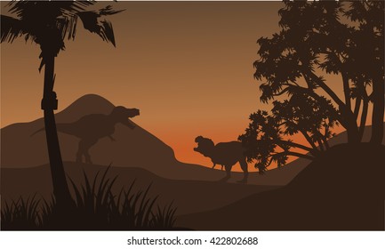 At afternoon tyrannosaurus in hills of silhouette beautiful scenery