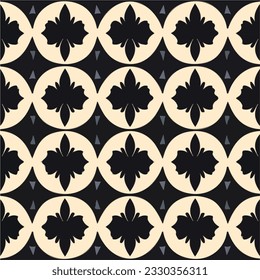 Against a black background, a dark flower pattern emerges in black and white, forming an intricate art deco motif in this repeating fabric pattern.
