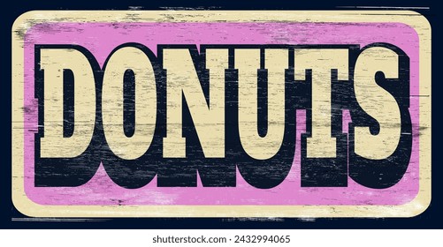 Aged vintage donuts sign on wood