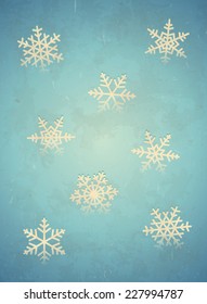 Aged winter card with halftone printed snowflakes