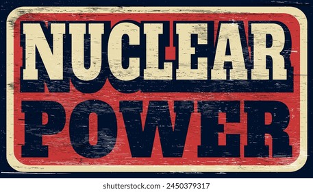 Aged and worn nuclear power sign on wood