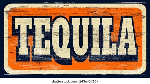 Aged and worn retro tequila sign on wood