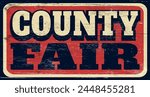 Aged and worn vintage county fair sign on wood